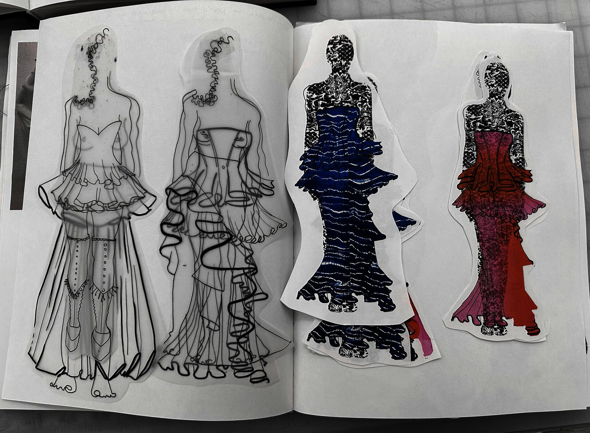 Sketchbook spread with layered fashion drawings and cut-out figures exploring sculptural garment silhouettes