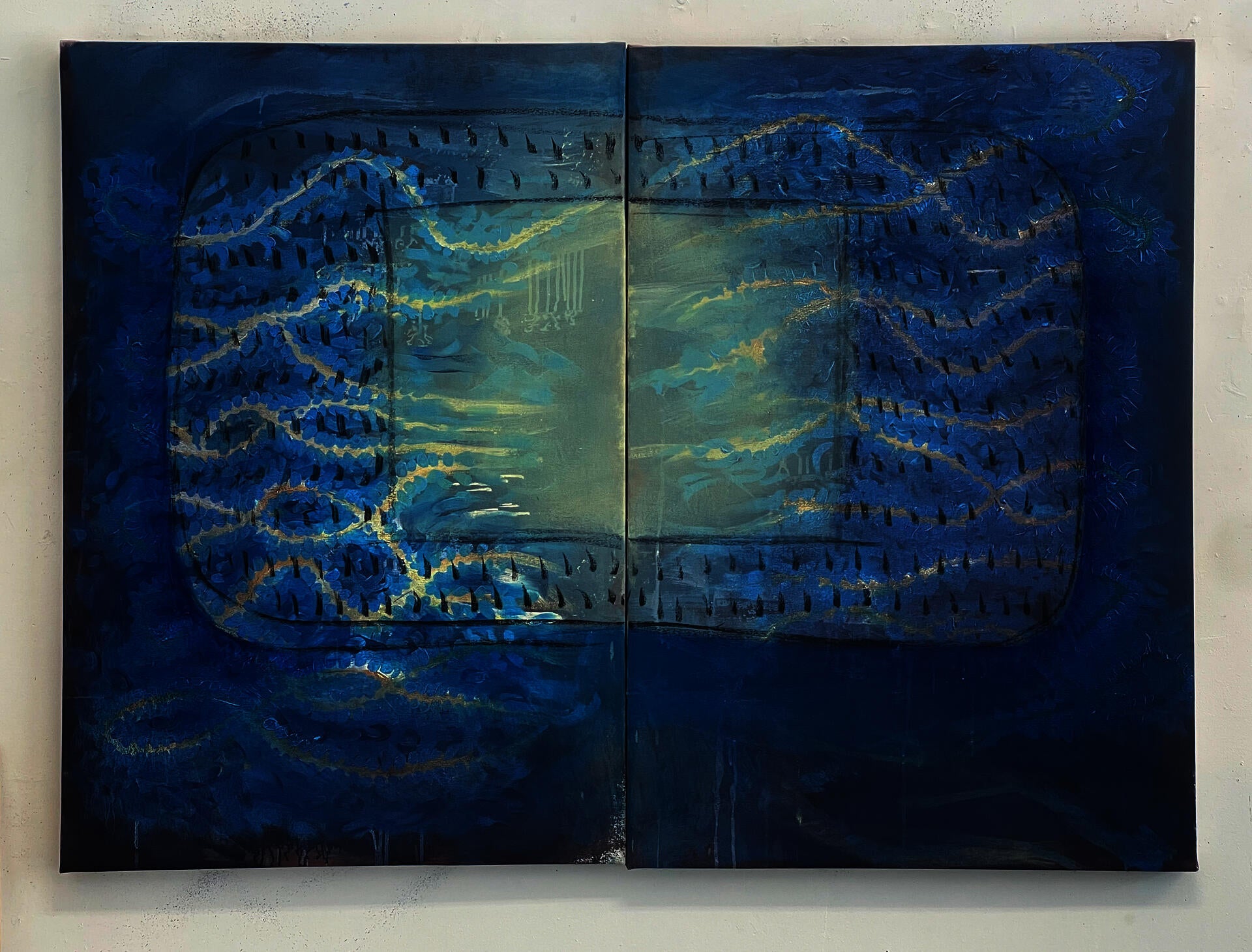 Two-panel blue abstract painting with a pale central rectangle, rounded dark border, looping gold and blue lines, black dash marks, and subtle vertical drips.