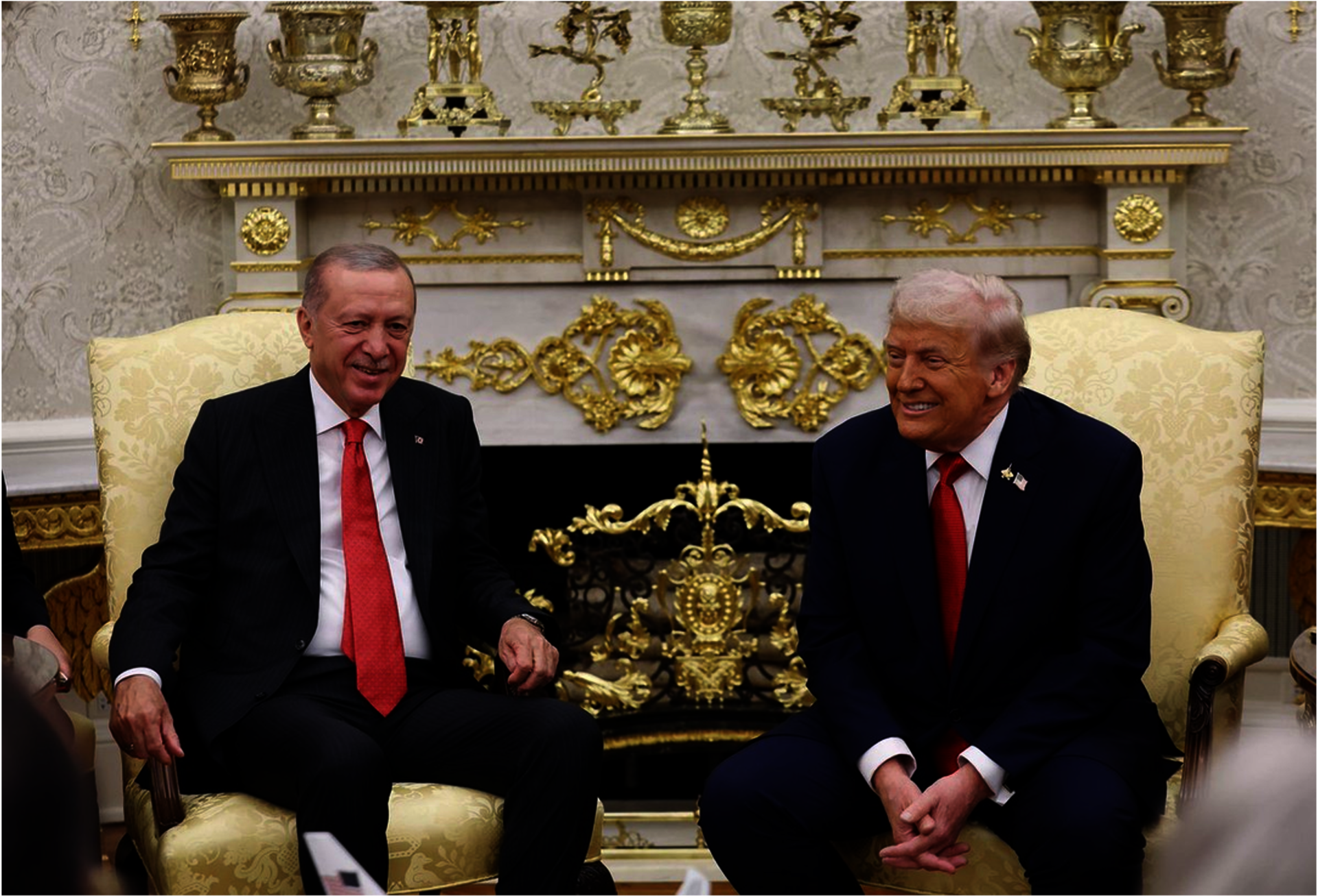 Erdoğan and Trump in Oval Office, gold ornamentation in the background.