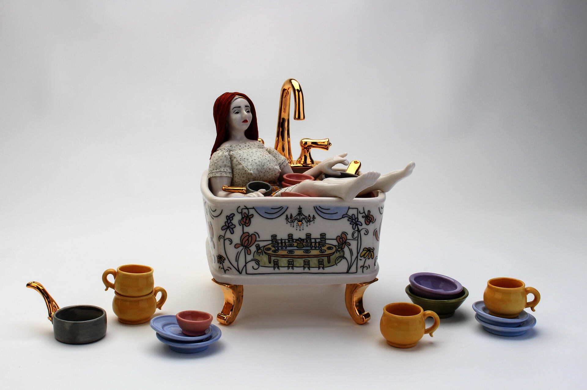 a sad doll sitting in a sink filled with colorful dishes, illustrated with a dining room scene and floral decoration