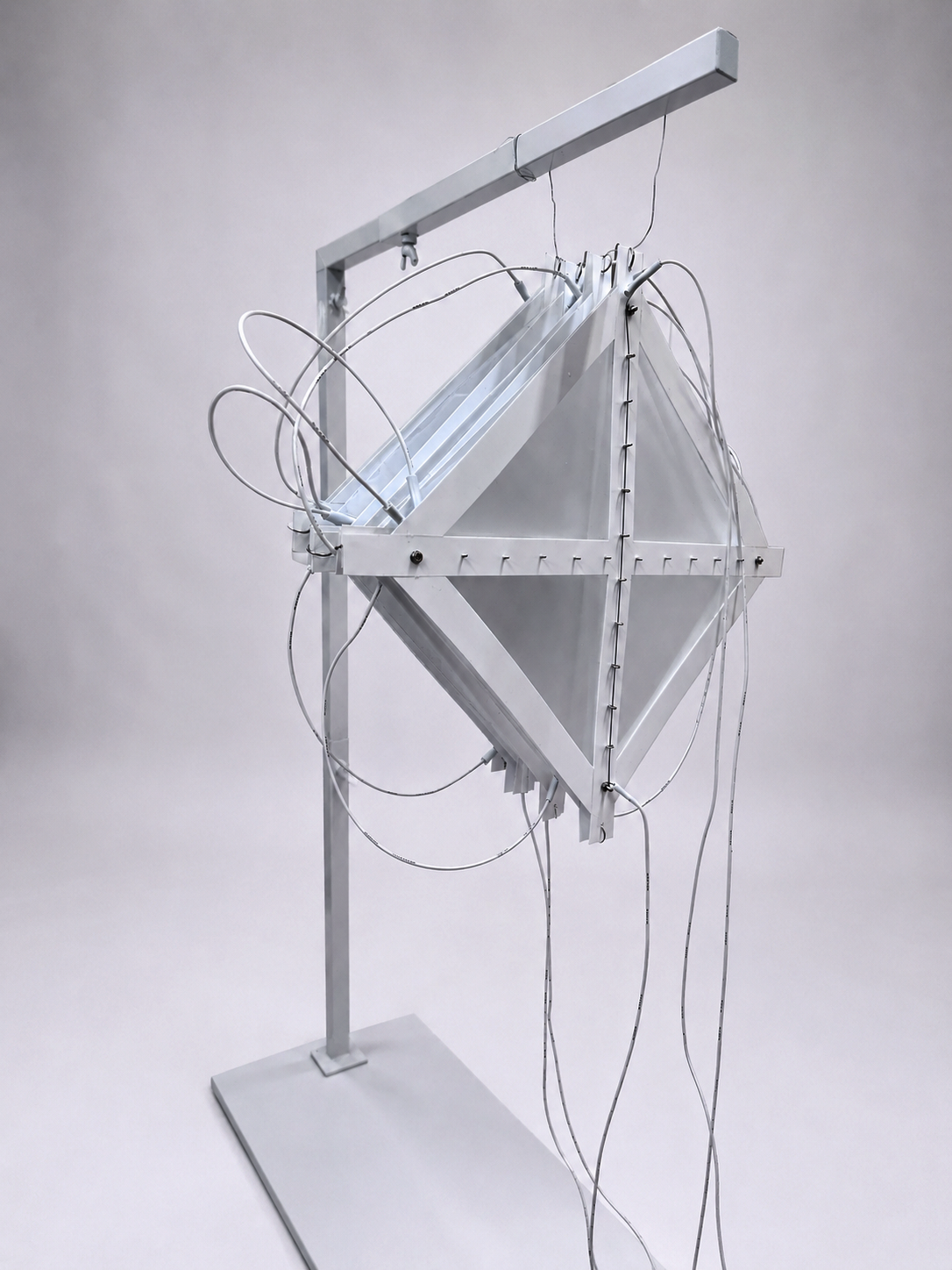 An assembly of eight Amphimorph surfaces with diagonally embedded Nitinol wire, joined together in an accordion-like configuration.