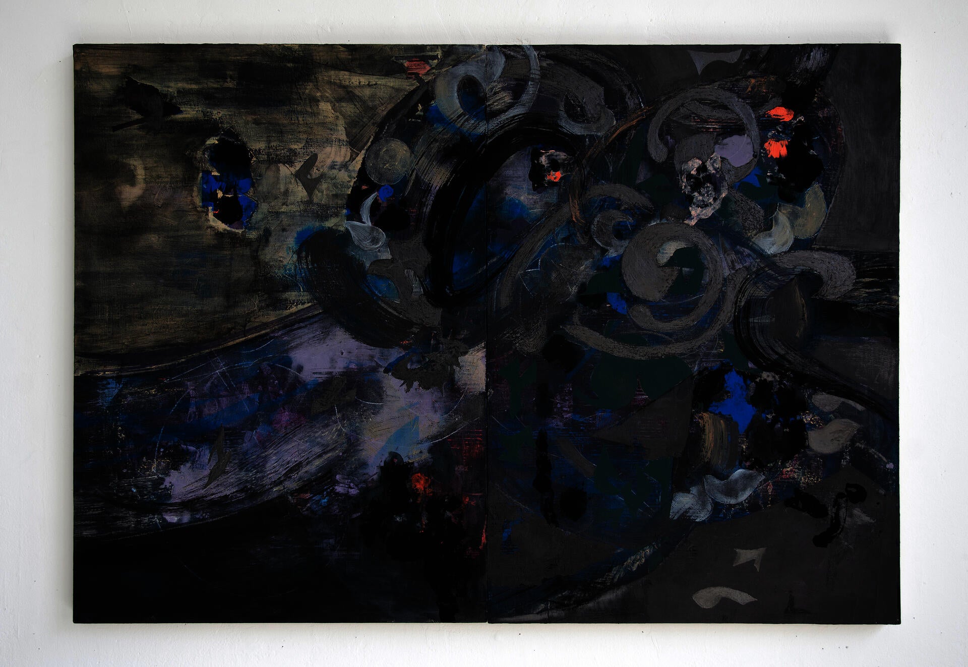 A dark grey painting with ink black calligraphical strokes, and marks, layering with spots of vibrant blue and orange paint.