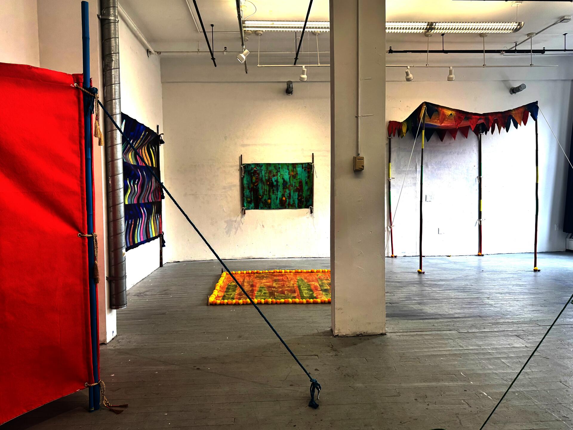 This image displays an Installation view. a deconstructed wedding tent, contains multiple pieces. 