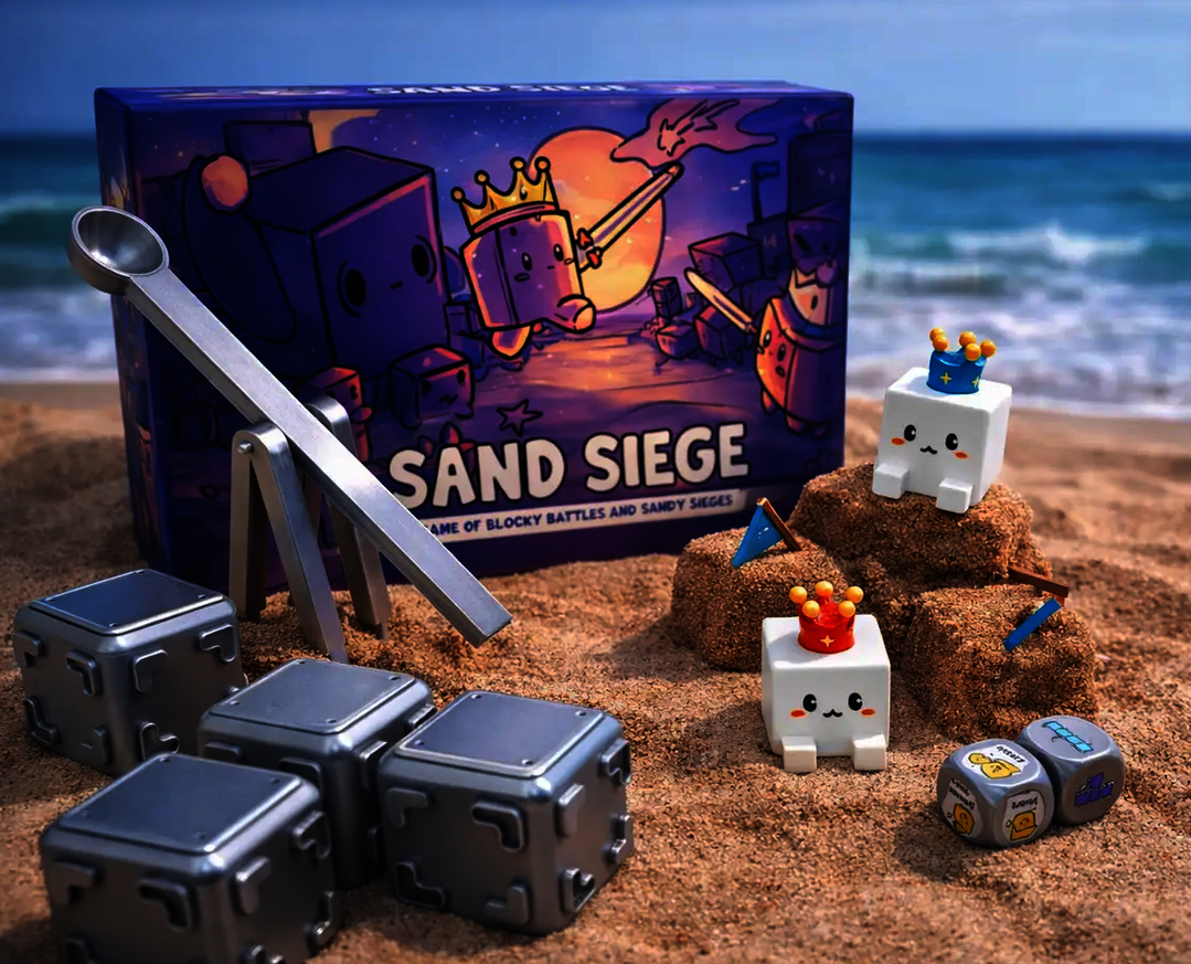 Sand Siege kit on a beach with modular blocks, box, and hand-powered catapult for sand structure gameplay.