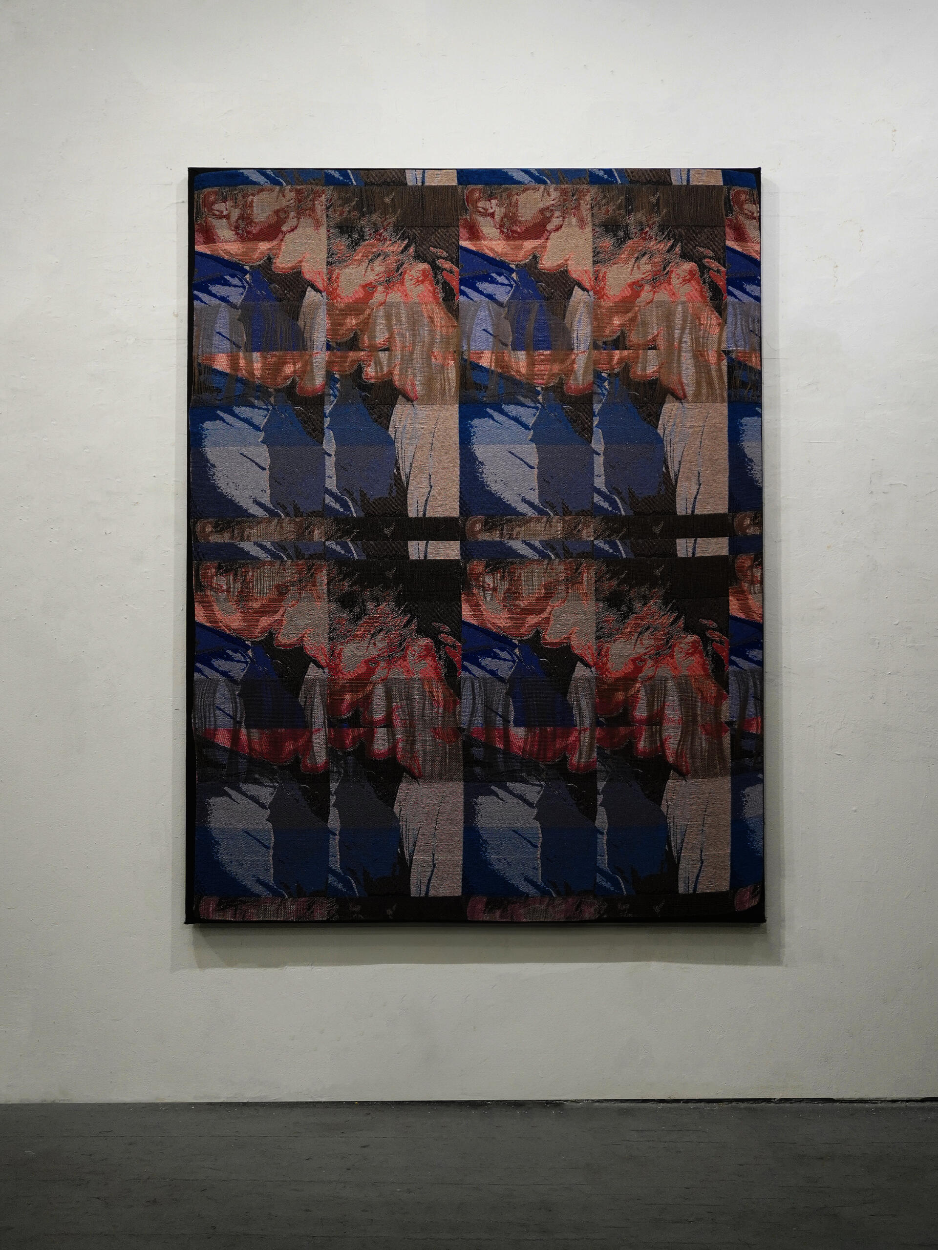 A woven textile pattern repeating a pixelated image of two men kissing, arranged in a four-part grid. Color shifts and layered yarn threads partially obscure and fragment the figures across the fabric