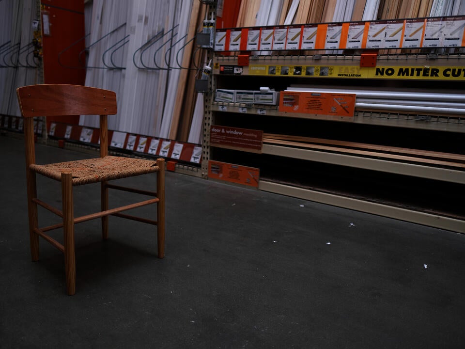 Image of Big Box Vernacular, an iteration of the J39 chair made entirely from tools and materials available at a home improvement center, in the moulding aisle of the Home Depot.