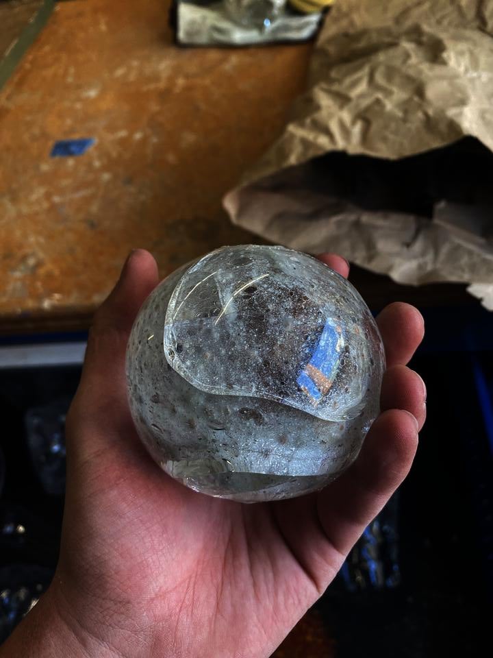 Glass sphere made form beach sand glass