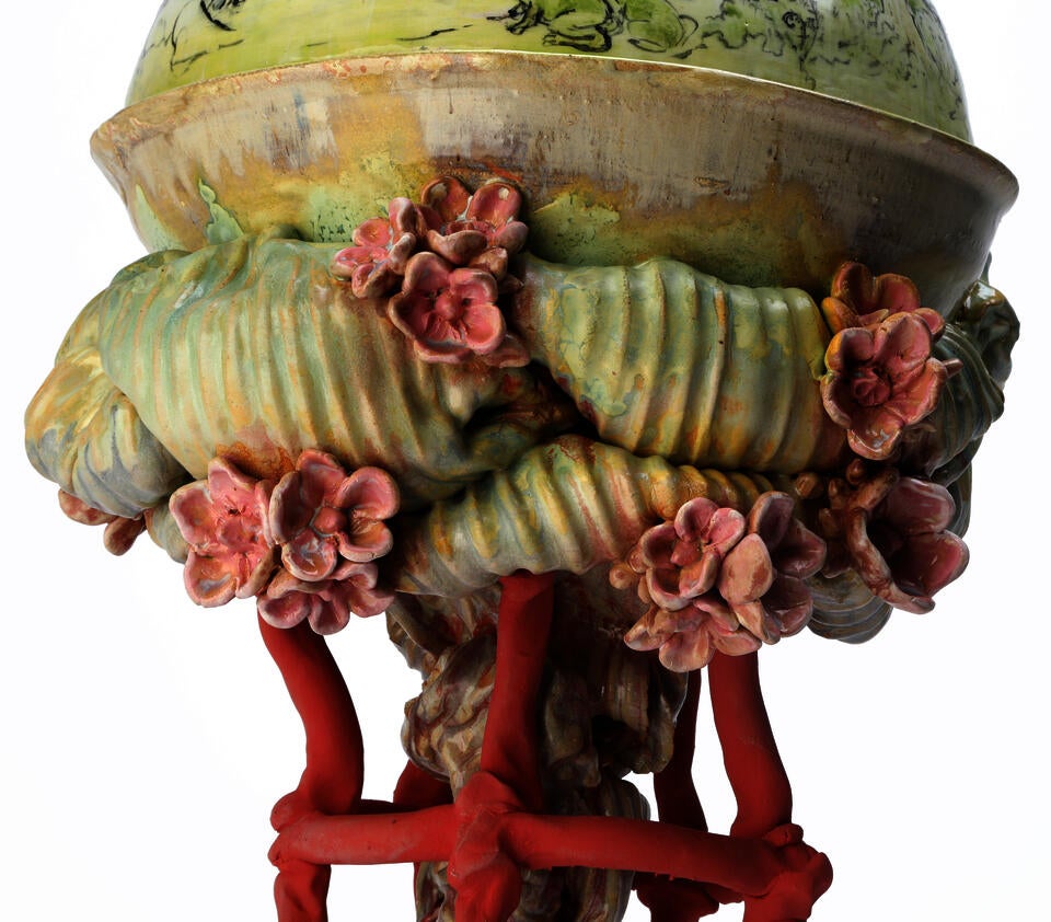 Close up of Spring Vessel with ceramic flowers errupting from vessel. 