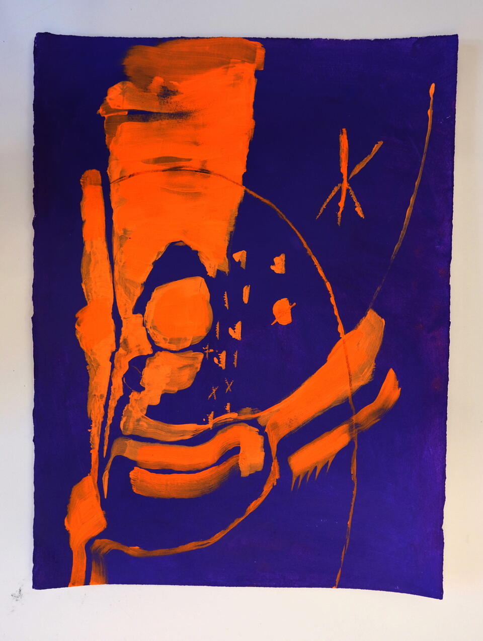Photo of an orange and purple abstract drawing