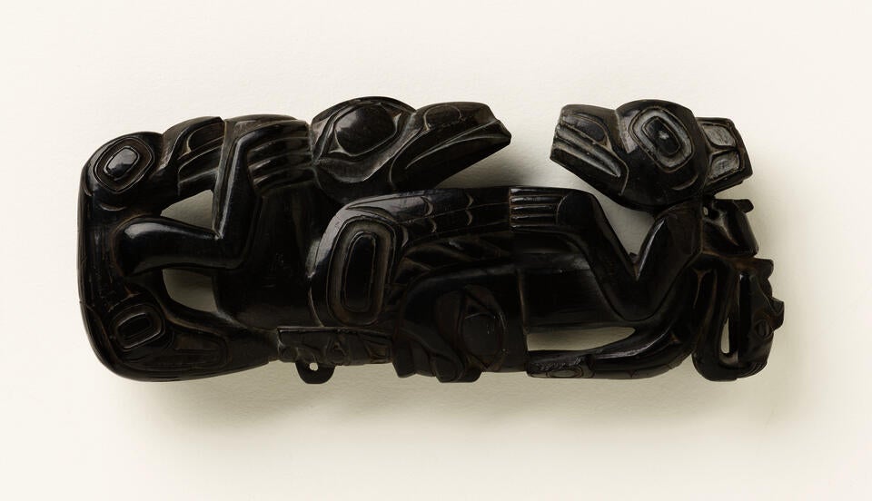 Stylized animal designs arranged in a rectangular format, all in black.