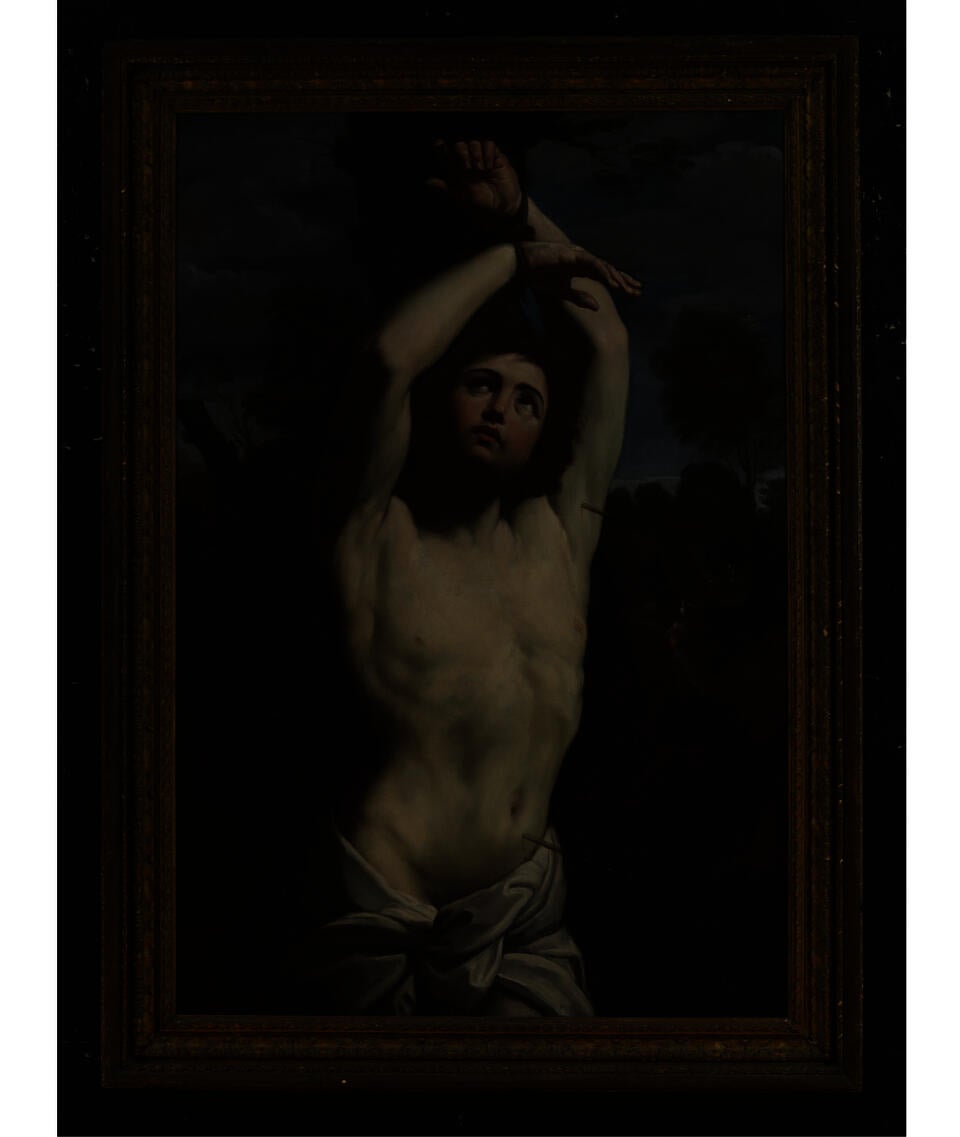 Painting of a young shirtless man, two thorns piercing his body, surrounded by a dark landscape. He looks upward at his hands, which are bound to a tree. 