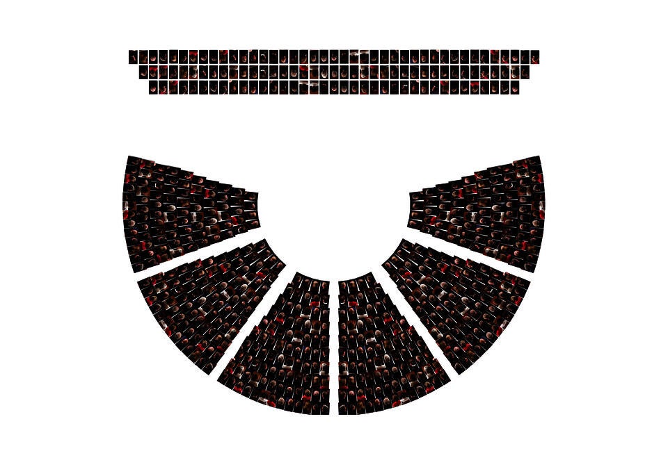 This image shows the cutout image of the politicians' heads facing away and is arranged based on the seating plan of the chamber of the United States House of Representatives.