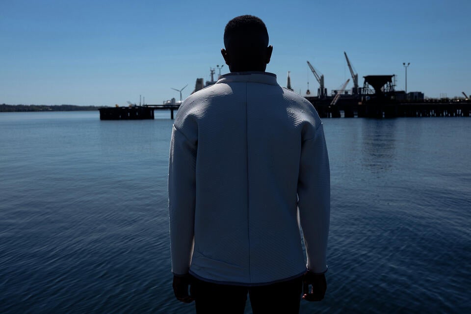 A concerned party, wearing the garment at the Port of Providence.