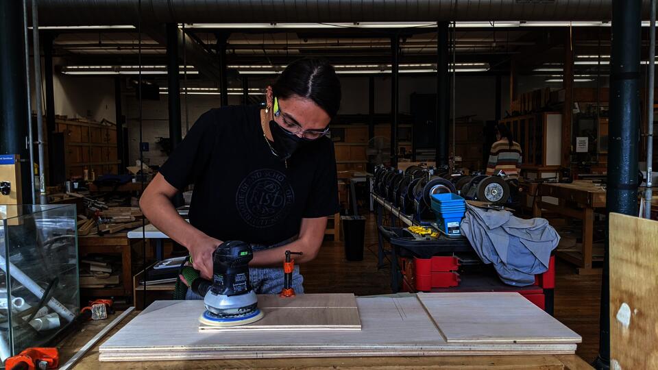 Sanding birch plywood to build the crop planner
