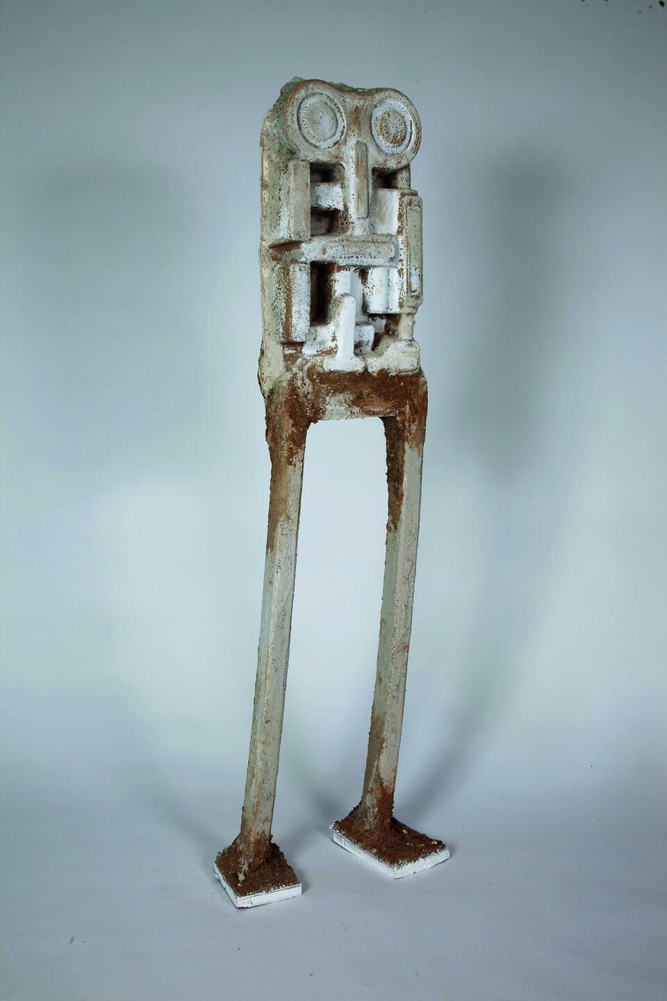 tall figure with cardboard head and torso