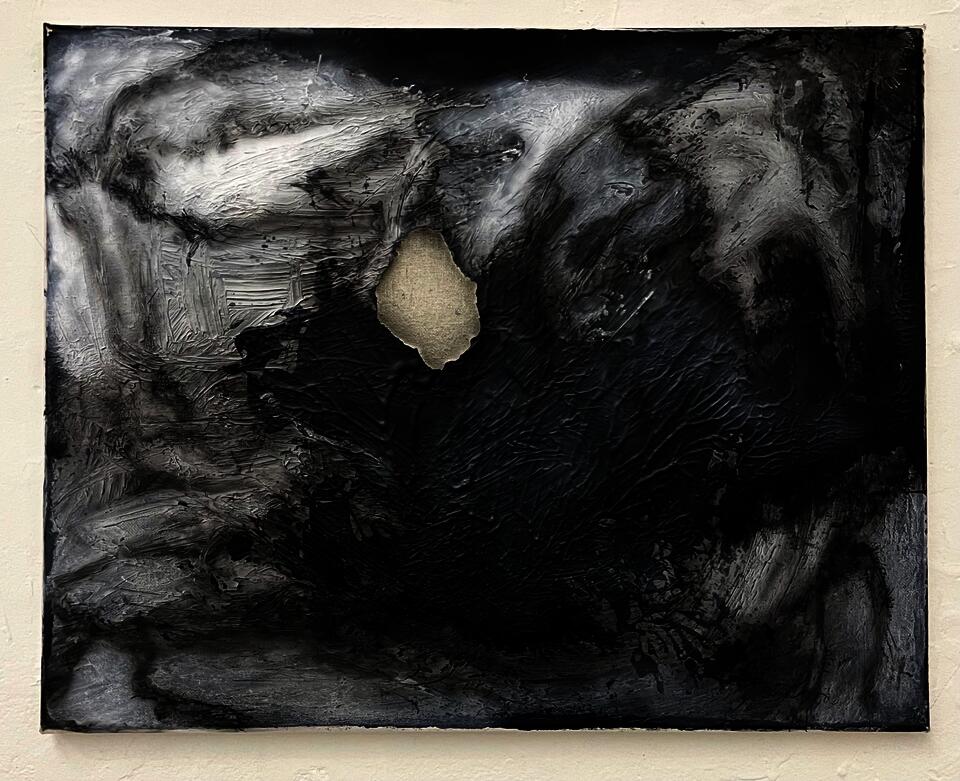  An abstract, monochromatic painting with a rock-shaped hole in the middle where the gesso was sanded off, revealing the textile underneath.  