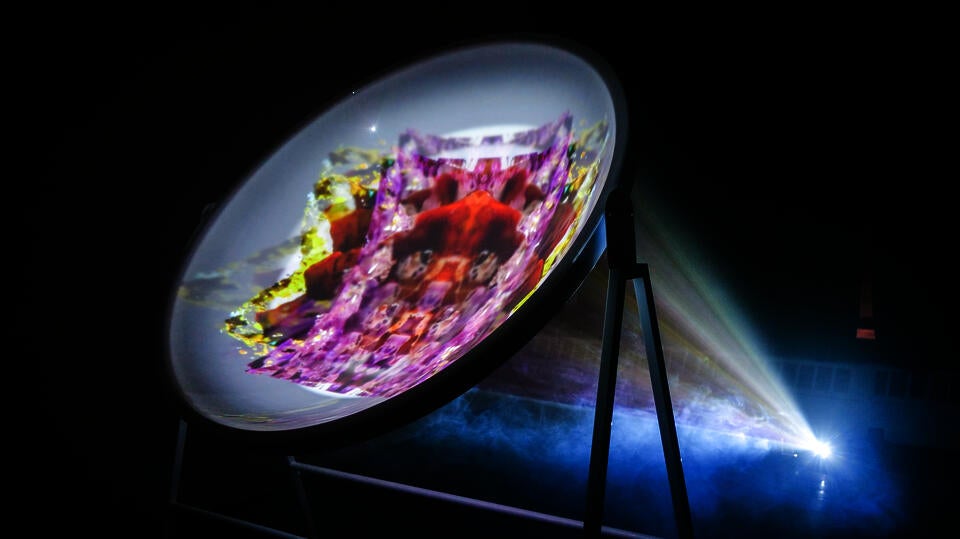 Photogrammetry animations projected on an acrylic dome and fog..