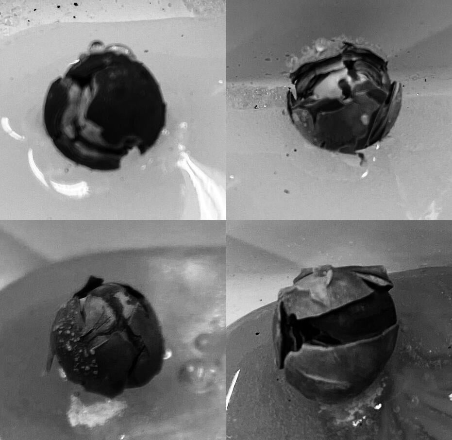 Four black and white photos in a grid formation of pearls in pâte de verre samples.