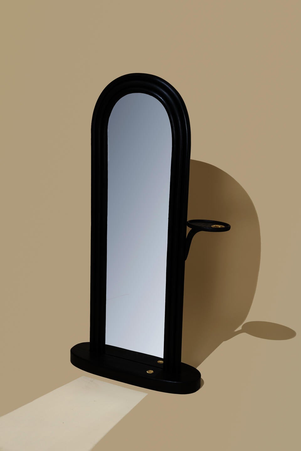 Black archway double sided mirror with hammered bronze details