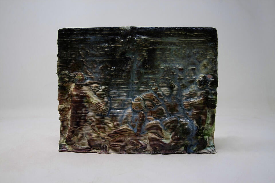 Blue and pink glazed ceramic tile scene showing crowd of people looking towards figure in the sky