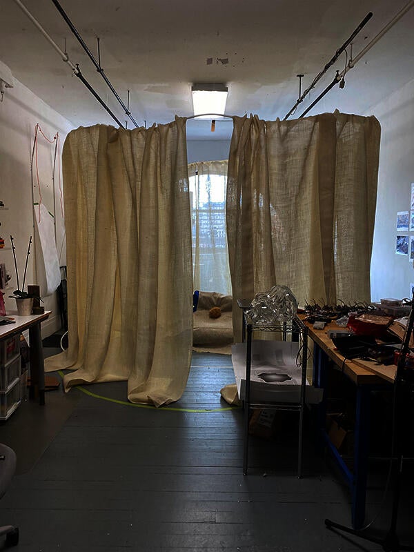 Hanging panels of burlap fabric in a circle formation