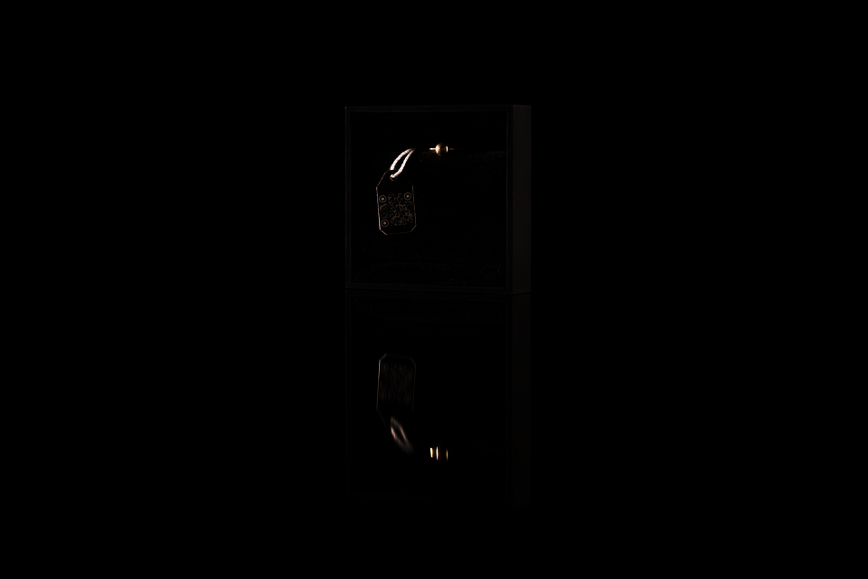 One of the square brooch with gold ring standing.