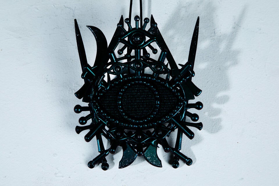 'Summoned Metamorphosis:  2020.1.23' jewelry piece against a black background / Model wearing and holding the jewelry piece 'Summoned Metamorphosis:  2020.1.23 /  Full view of the jewelry piece 'Summoned Metamorphosis:  2020.1.23' on a white background / Close-up detail shot of a jewelry piece 'Summoned Metamorphosis:  2020.1.23 