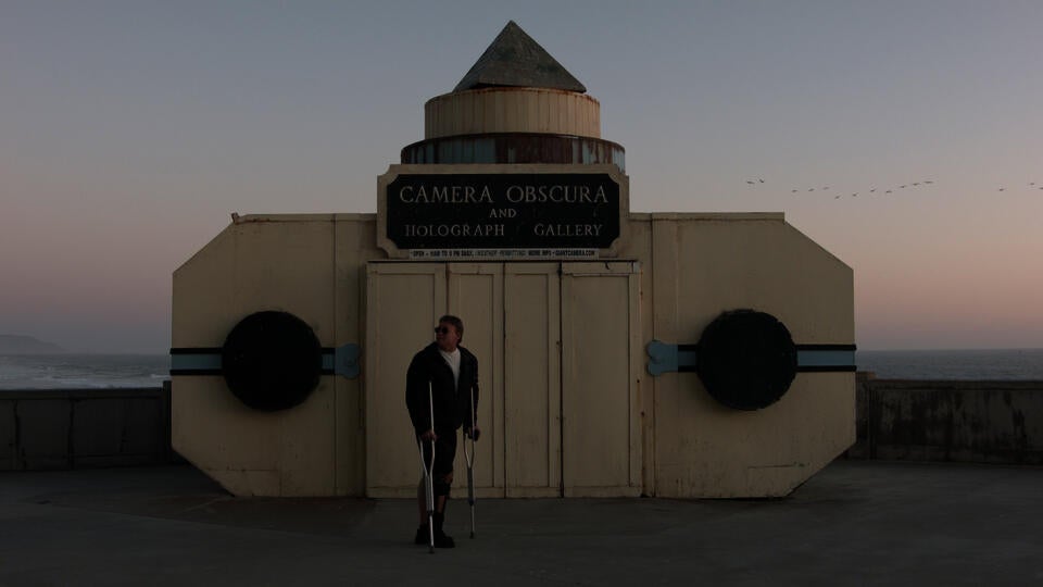 A man in front of the Camera Obscura