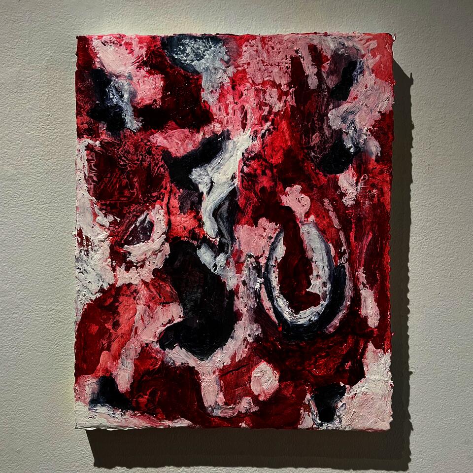 A layered painting with visible areas and others with accumulated material 