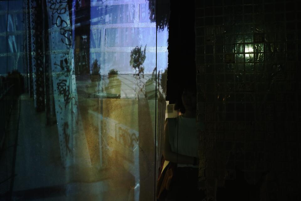 Audience standing in front of the screen