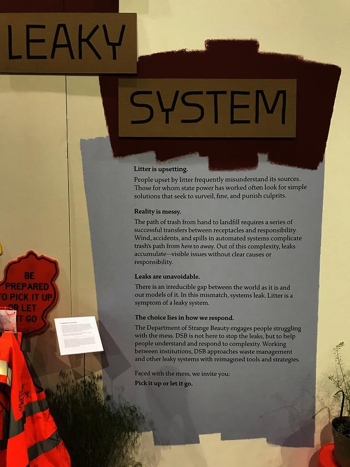 Installation view of wall text from "Freedom is a Leaky System"