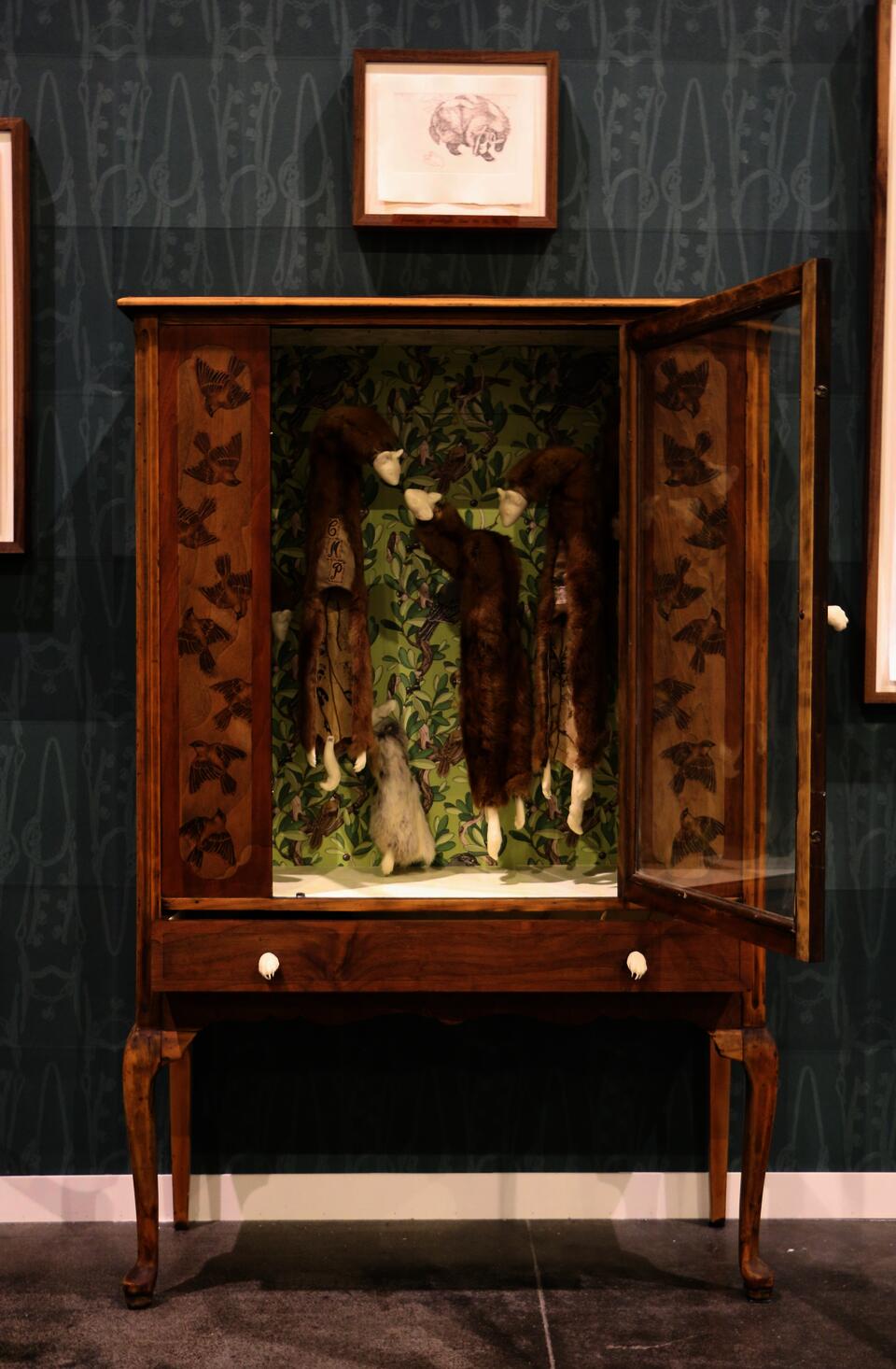 Cabinet with minks and rabbits inside