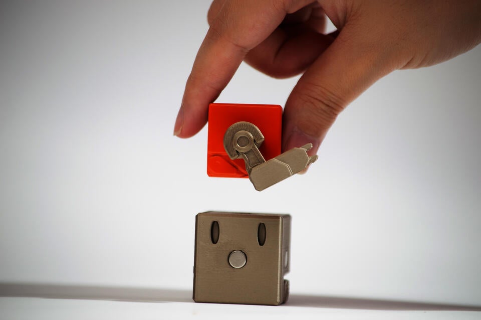 Snapbot in user's hand