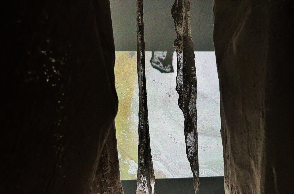 Projection, fabrics hanging, transparencies