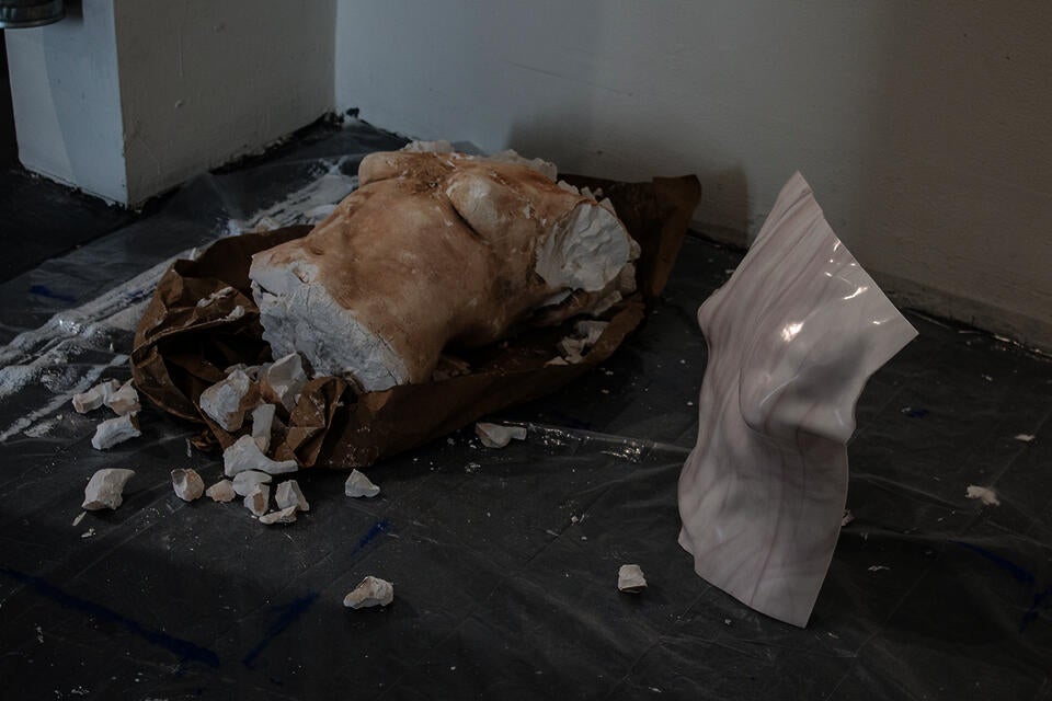 Kiln slumped glass - the torso cast is of the artist's body