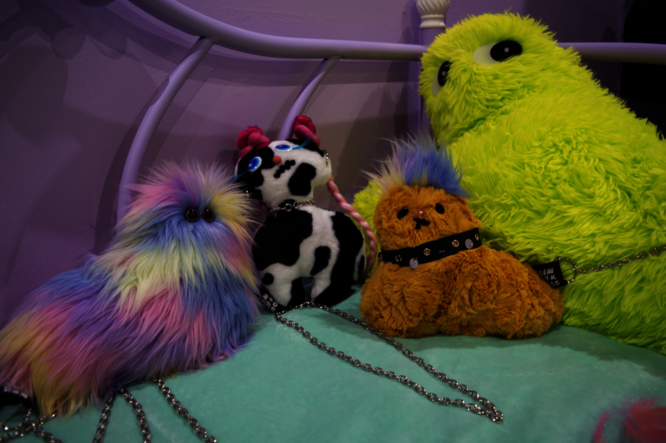 Detail photograph of toys, ranging from cute to sad to unsettling.