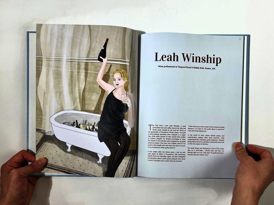 A photograph of a book spread featuring an illustrated woman holding a wine bottle on the left page, and interview profile of "Leah Winship" on the right page 