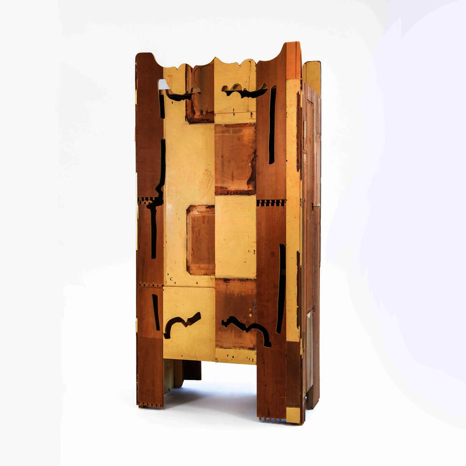 A Cabinet made from the deconstructed materials of a found dresser in warm yellow.