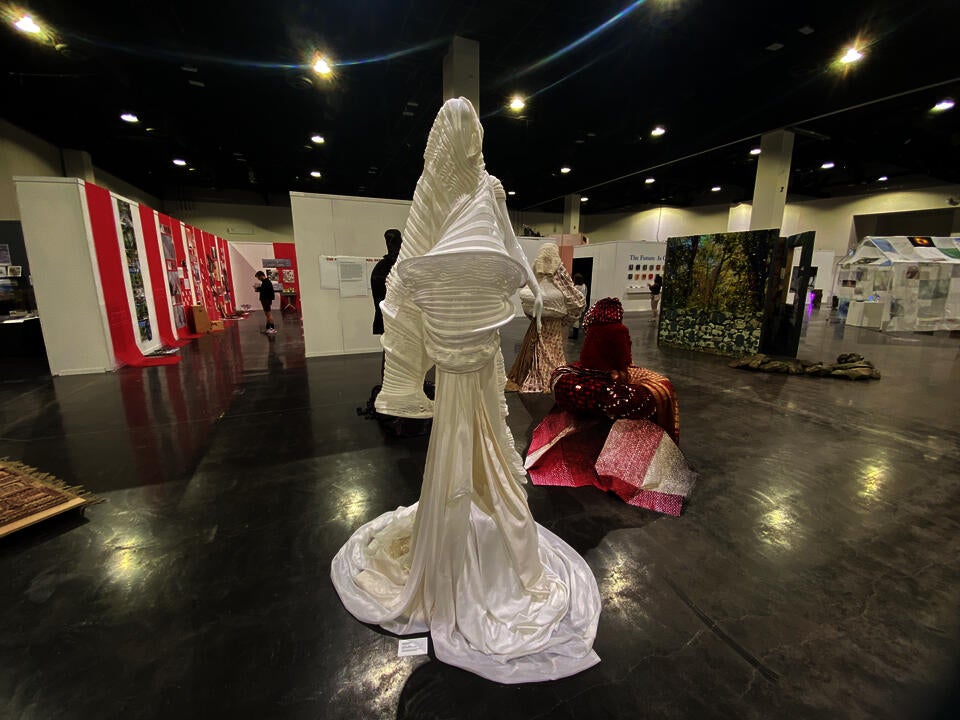 The islands around each garment situate them in their speculative futures.