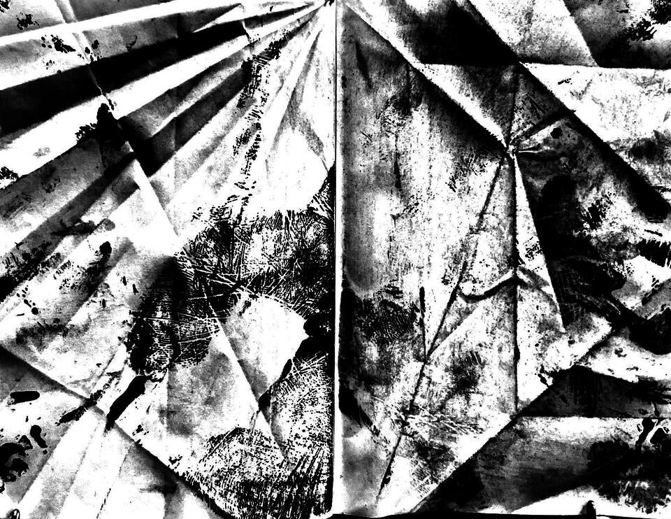 A scan from a book of vellum, whose pages have been creased, rubbed, and imprinted on. Here, a non-human object is humanized.