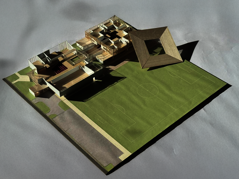 Model of the school with surrounding context. Roof is removable to show interior spaces.
